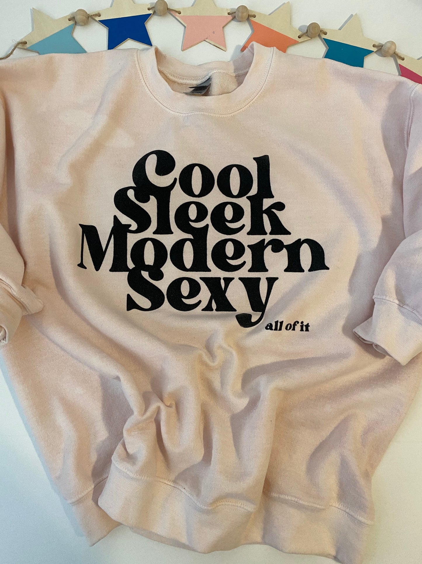 Cool, sleek, modern, sexy, all of it. Sam Kiszka quote sweatshirt. Light peach crewneck Greta Van Fleet sweatshirt.